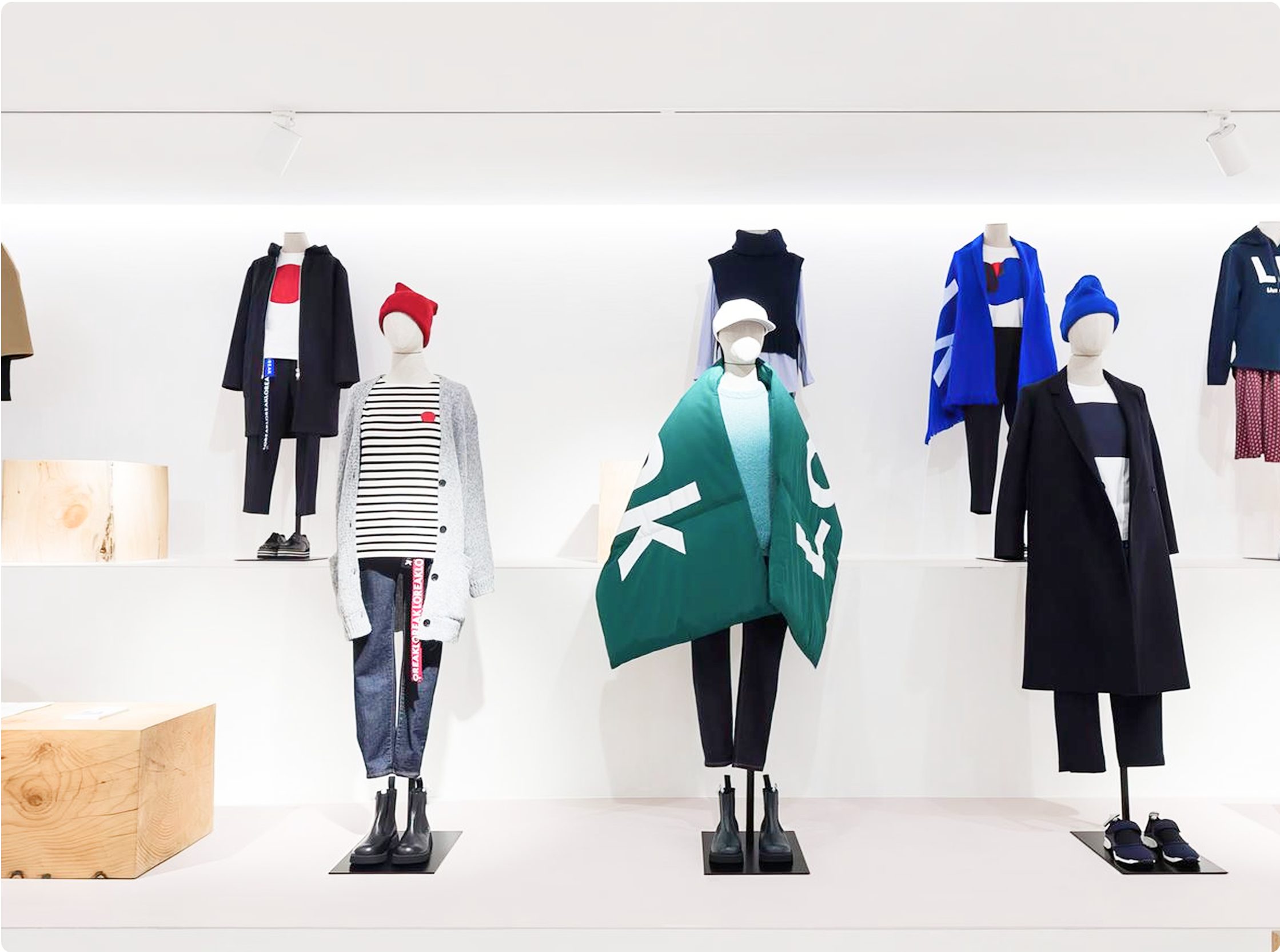 Designer and limited-edition pieces displayed on mannequins in a fashion boutique