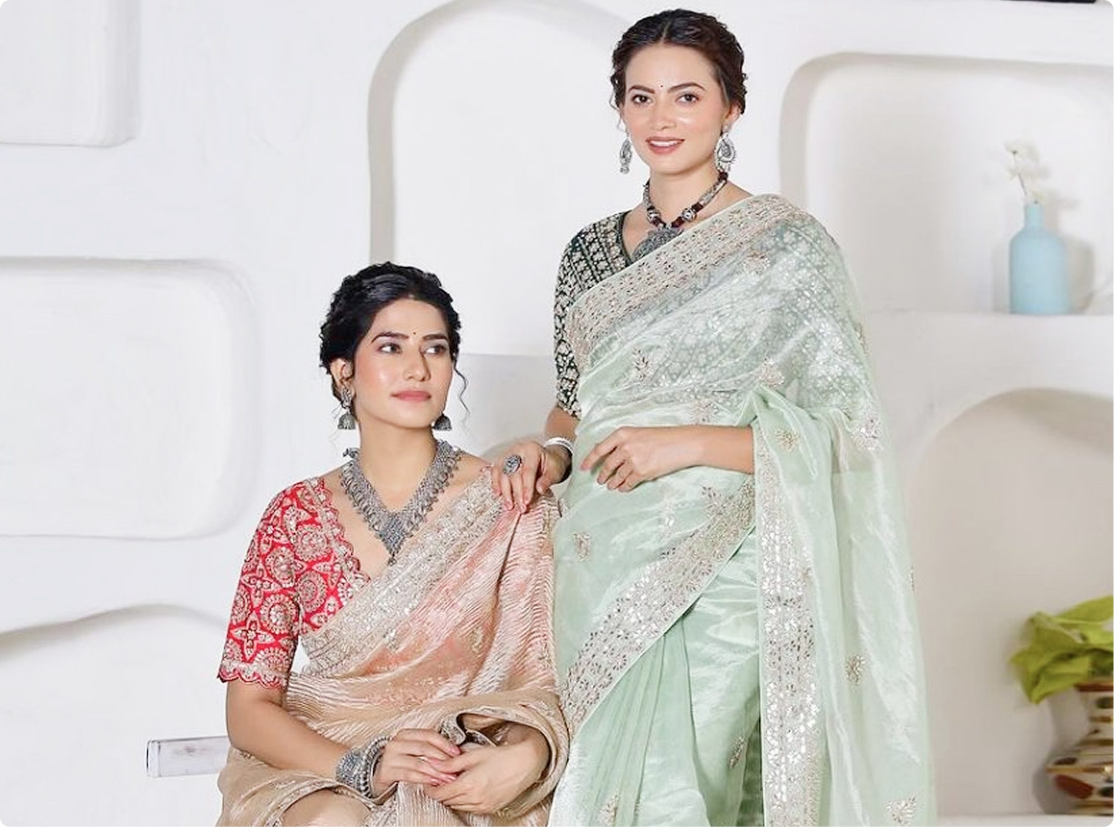 Two generations in heritage silk sarees preserved with museum-grade Vanzoo care