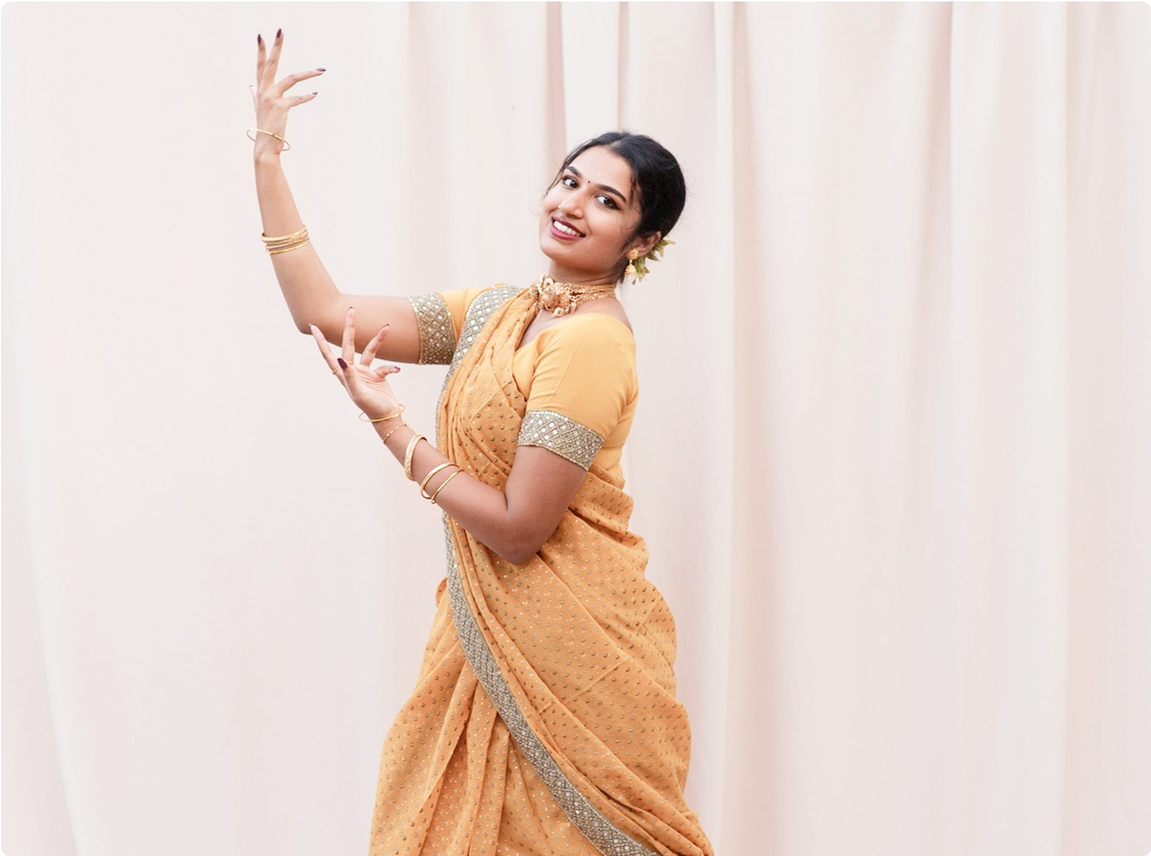 Classical dancer in performance costume cared for by Vanzoo garment specialists