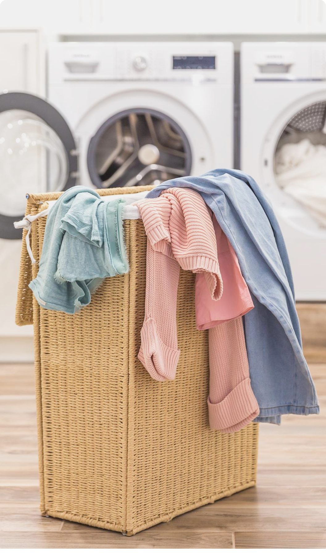 Basket of clothes ready for free Vanzoo doorstep pickup and delivery in Gurgaon