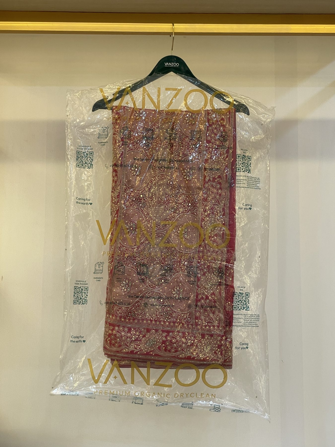 Embroidered saree in Vanzoo protective garment packaging